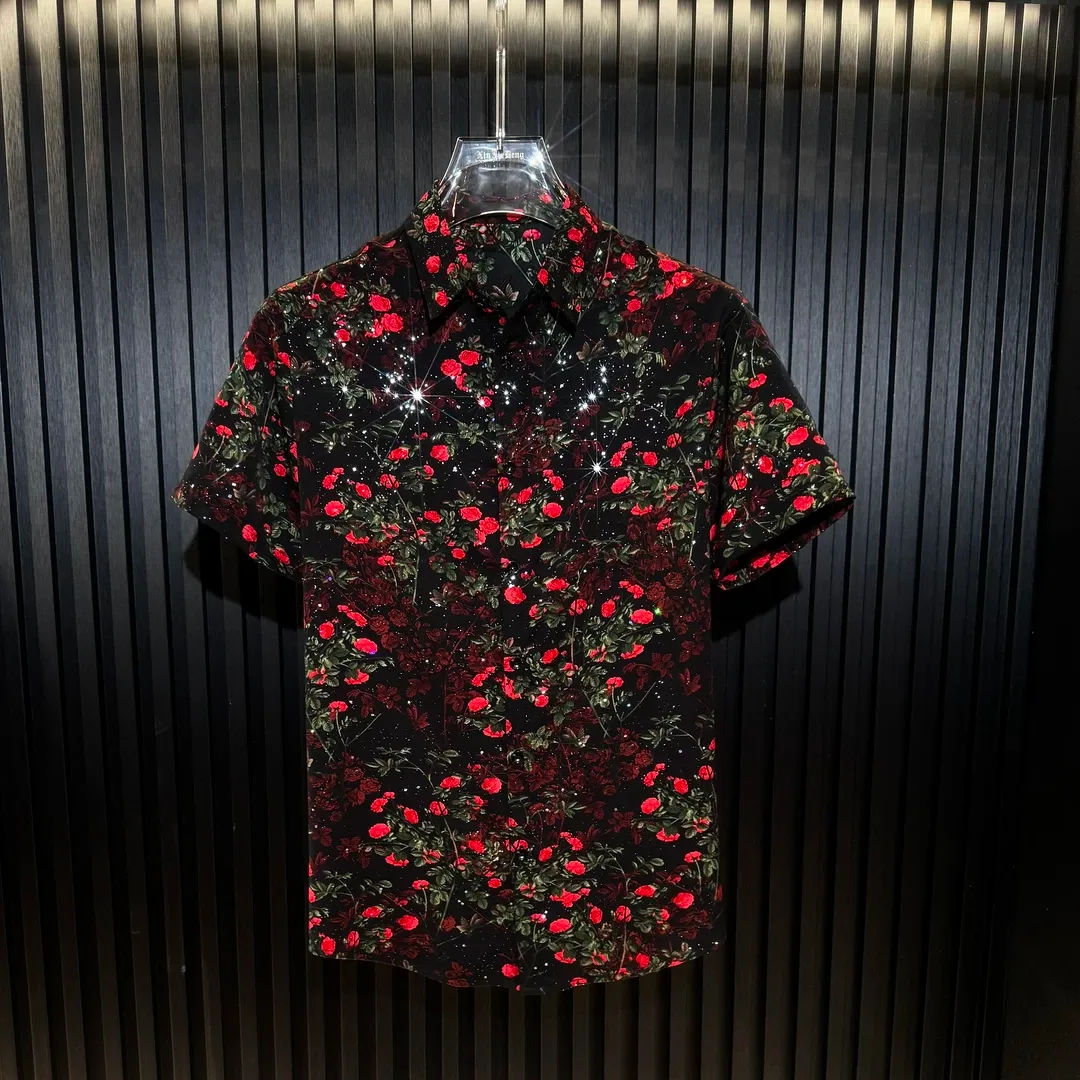 Men's short-sleeve shirt featuring a red flower standing tall on a cliff's edge.