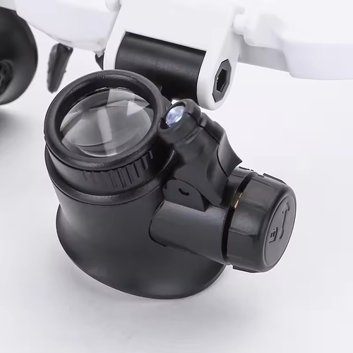 Dual lens jewelry magnifying glass with LED headphone lighting