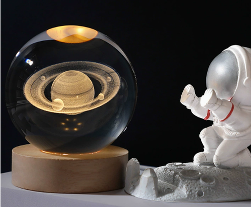 Crystal ball with engraved light