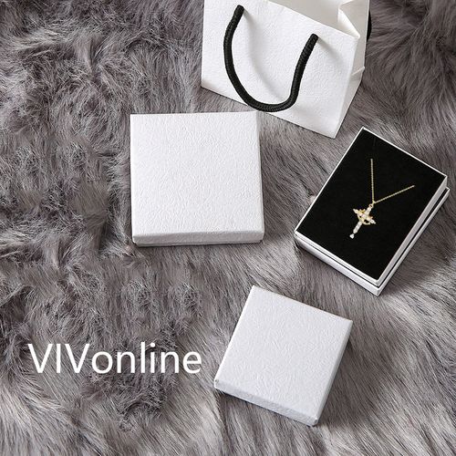 Three-piece set of titanium steel cross necklaces in a gift box, featuring design and colorful cubic zirconia stones.