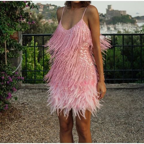 Women's dress with feather fringe and sequined spaghetti straps