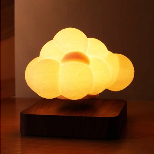 Magnetic levitation makes the clouds float on the wooden base, with a matte texture enveloping soft light. Touch control to switch between RGB colors, warm yellow for healing, and gradient for romance. The soft light is not dazzling, and it can be used as both a night light and a decorative piece. It fits well in bedrooms and desks. With a single charge, it has a long battery life. Bring the gentle touch of the clouds into your life. Hurry and place an order to bring it home!
