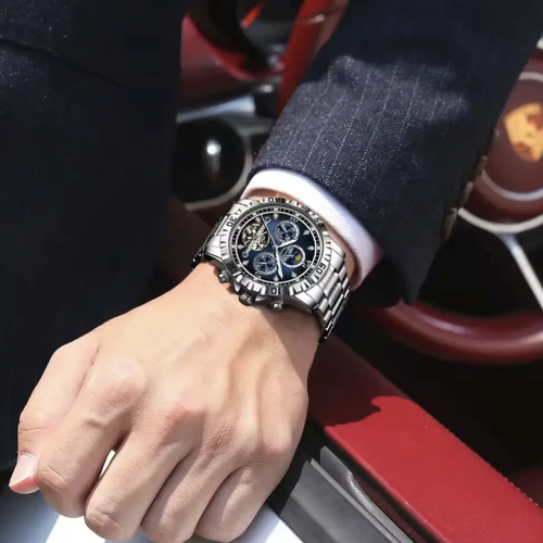 The new model of Swiss brand automatic mechanical men's watch features a hollow rotor that showcases the mechanical aesthetics. It comes with multi-function chronograph and moon phase calendar. The watch is made of stainless steel, which is durable and water-resistant. The blue dial and silver strap are versatile and suitable for various occasions. It has precise timekeeping and is an excellent high-end men's wristwatch for both business and leisure, as well as for personal gifts.