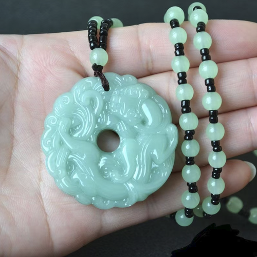 Order today and you will receive 2 ancient Chinese auspicious charm five-element energy necklaces. There are two colors of jade available for selection, with exquisite and delicate craftsmanship. They symbolize good fortune and can be paired with various outfits. Suitable for both men and women. The style is retro and elegant, comfortable to wear, and suitable for daily wear or as a gift for friends. It is a practical and fashionable Chinese accessory.