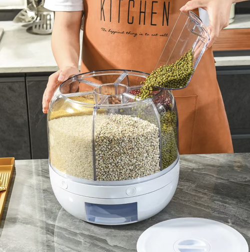 360-degree rotating compartmentalized whole grain storage box, made of food-grade material. It has multiple compartments for storing dry grains. Pressing one button can release the contents. The transparent compartment is convenient for checking the remaining quantity. The sealed design helps prevent moisture and pests. The sealing is only an auxiliary protection measure and cannot completely eliminate pests.