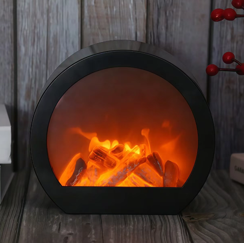 This LED imitation charcoal flame lamp features a semi-circular shape with a transparent window and is equipped with simulated charcoal inside. The LED light simulates the glow of charcoal fire, without any open flame or smoke. It is only used for creating an atmosphere and does not have a heating function. When placed on the table, it is suitable for creating a cozy atmosphere in homes or guesthouses. When using it, keep it away from flammable items.