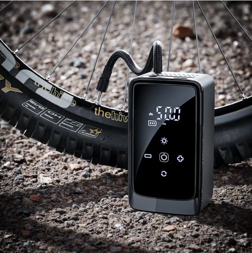 This mini car-mounted wireless inflation pump features a digital display and lighting. It can preset tire pressure and automatically stops when it reaches the target value. It comes with multiple air nozzles, which can be used for inflating tires, balls, etc. It is equipped with a charging cable and a storage bag. It is small and portable, suitable for emergency tire inflation during travel. It adds convenience to your journey.