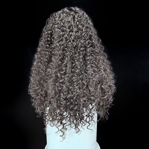 Glue-free, natural-style long curly wig in dark brown-black — includes wig cap and care solution.