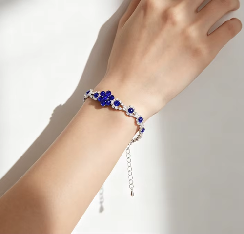 New stylish and luxurious crystal gemstone teardrop necklace, earring, and bracelet set.