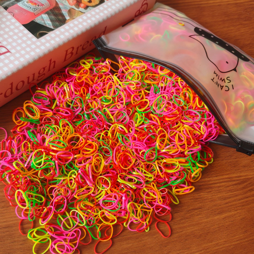 Popular small, disposable rubber bands for children—perfect for tying hair.