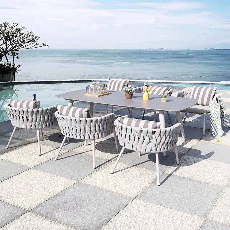 4 Piece Modern Outdoor Dining Set Oval Table and Woven Rope Chairs with Cushions Weather Resistant Patio Furniture for Garden and Terrace