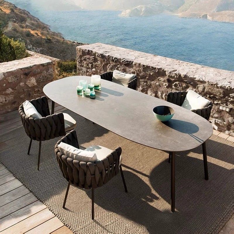 4 Piece Modern Outdoor Dining Set Oval Table and Woven Rope Chairs with Cushions Weather Resistant Patio Furniture for Garden and Terrace