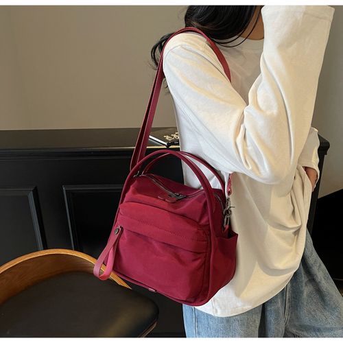 Simple, lightweight, casual, one-shoulder, hand-held, commuter bag for women, new style, fashionable and versatile Oxford cloth messenger bag