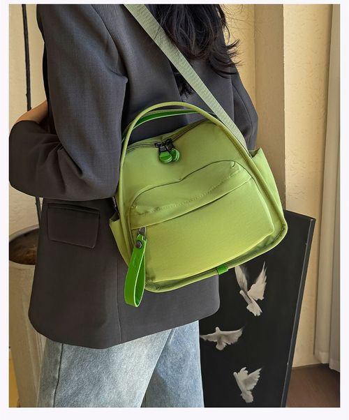 Simple, lightweight, casual, one-shoulder, hand-held, commuter bag for women, new style, fashionable and versatile Oxford cloth messenger bag