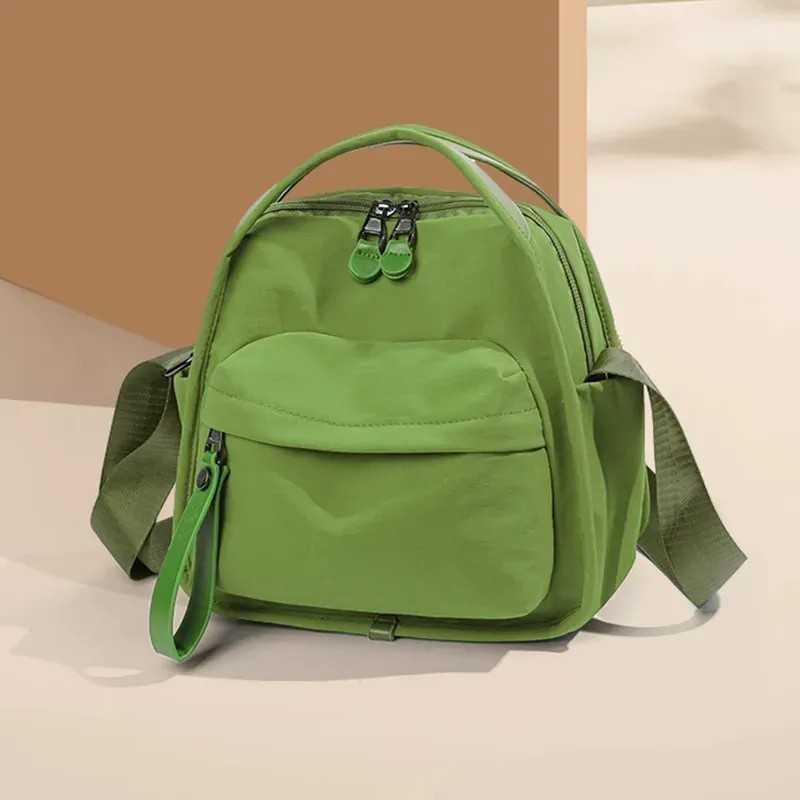 Simple, lightweight, casual, one-shoulder, hand-held, commuter bag for women, new style, fashionable and versatile Oxford cloth messenger bag