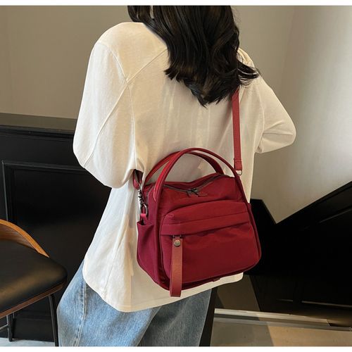 Simple, lightweight, casual, one-shoulder, hand-held, commuter bag for women, new style, fashionable and versatile Oxford cloth messenger bag