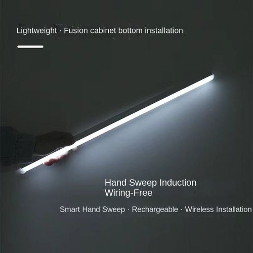 Modern LED USB motion-sensing night light strip with charging function for living room shoe cabinet, featuring magnetic attachment.