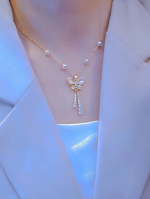 Tassel butterfly pendant fresh and elegant, fashionable light luxury, simple and versatile, high-end titanium steel pearl necklace women
