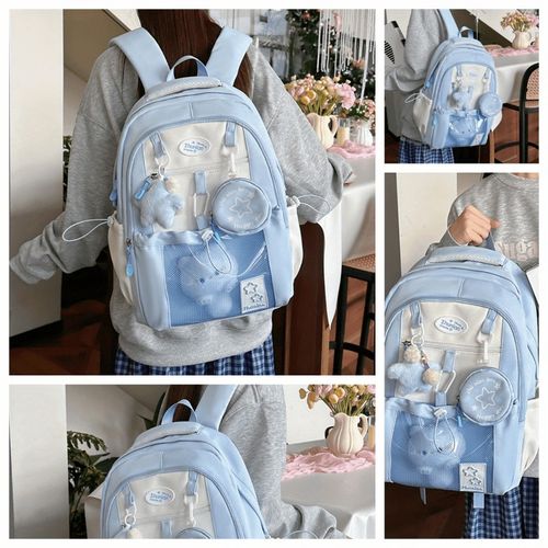 Lightweight and versatile stylish backpack, made of high-quality, water-resistant nylon, upgraded capacity, with color-blocking design, casual college-style shoulder bag, comes with cute charms, a bag loved by both boys and girls, available in four colors.