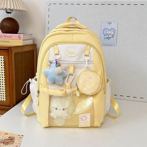 Lightweight and versatile stylish backpack, made of high-quality, water-resistant nylon, upgraded capacity, with color-blocking design, casual college-style shoulder bag, comes with cute charms, a bag loved by both boys and girls, available in four colors.