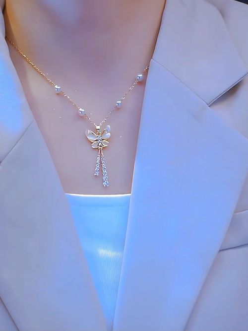Tassel butterfly pendant fresh and elegant, fashionable light luxury, simple and versatile, high-end titanium steel pearl necklace women