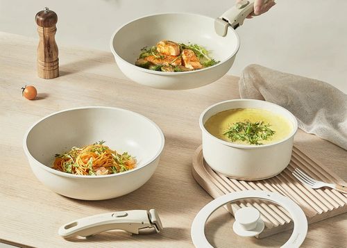 Modern 5-piece nonstick cookware set of metal pots and pans with removable handles