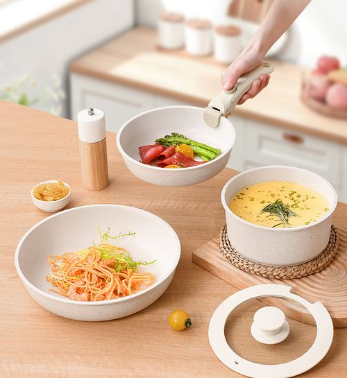 Modern 5-piece nonstick cookware set of metal pots and pans with removable handles