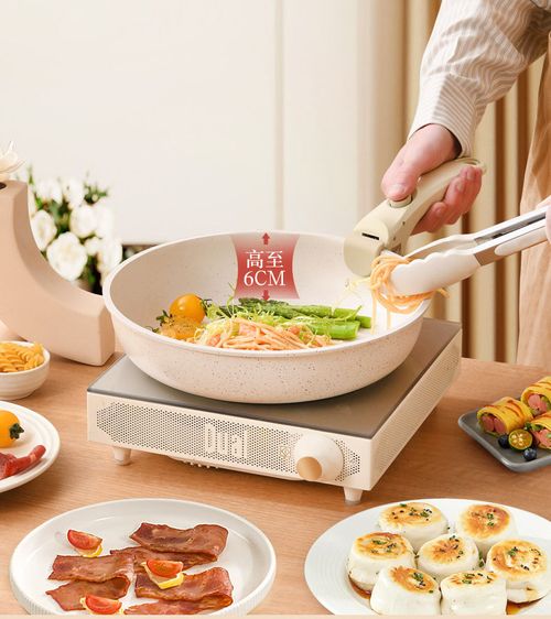 Modern 5-piece nonstick cookware set of metal pots and pans with removable handles