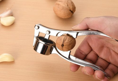 Manual garlic crusher, walnut crusher, wine bottle opener 3-in-1