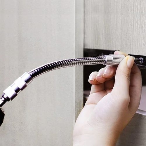 Universal metal screwdriver bit for electric drills and screwdrivers