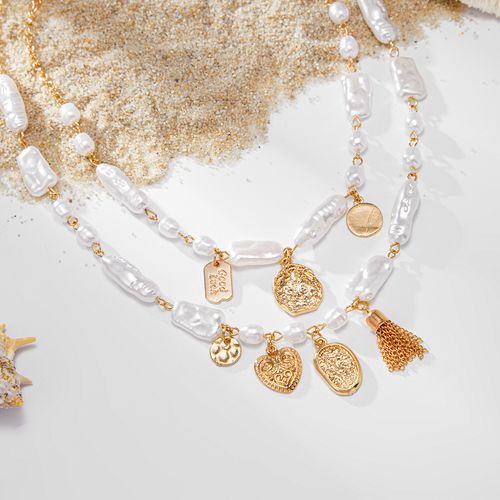 Baroque Irregular Pearl Necklace - Sexy & Stylish INS Metal Relief Heart Pendant | Chic Collarbone Jewelry for Fashion-Forward Looks