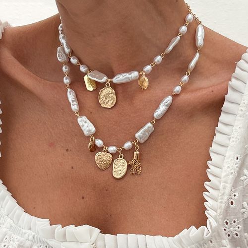 Baroque Irregular Pearl Necklace - Sexy & Stylish INS Metal Relief Heart Pendant | Chic Collarbone Jewelry for Fashion-Forward Looks