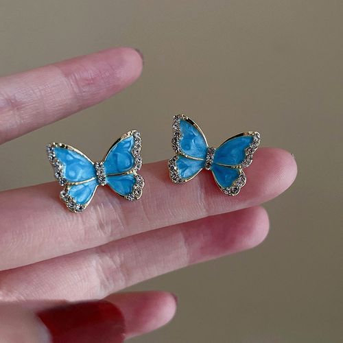 Vintage-inspired high-end flower stud earrings, understated luxury, niche style, versatile women's earrings with tassel design.