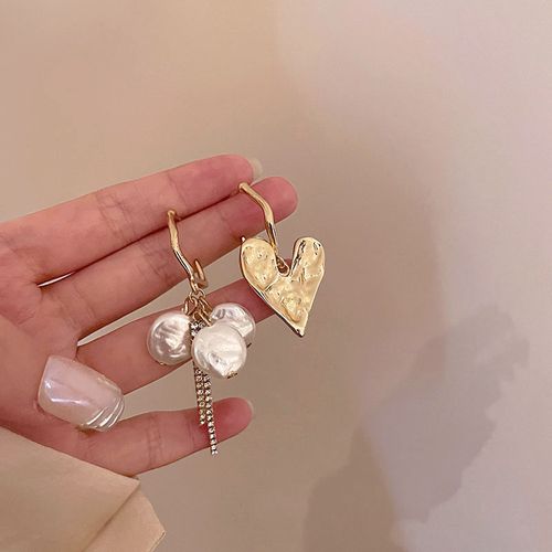 Vintage-inspired high-end flower stud earrings, understated luxury, niche style, versatile women's earrings with tassel design.