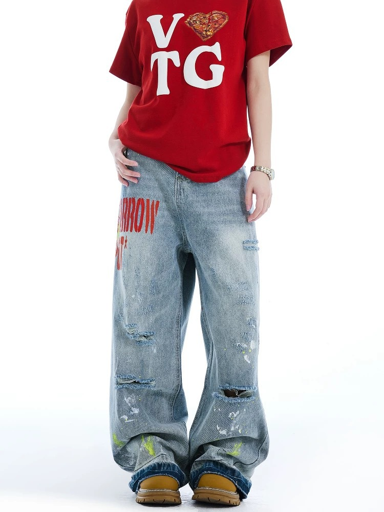 Graffiti ripped jeans