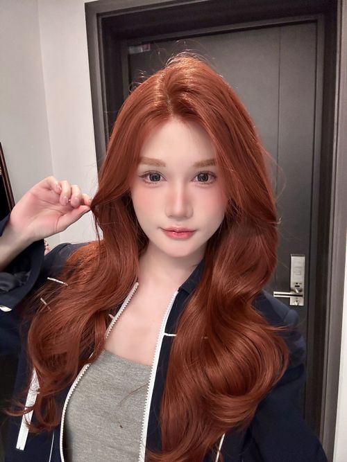 Caramel reddish-brown long curly wig
