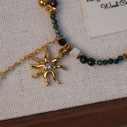 The color scheme is inspired by Monet's Yellow Irises. Natural stone titanium steel sunflower handmade beads niche retro versatile simple clavicle chain
