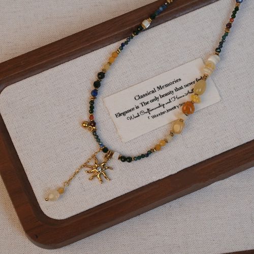 The color scheme is inspired by Monet's Yellow Irises. Natural stone titanium steel sunflower handmade beads niche retro versatile simple clavicle chain