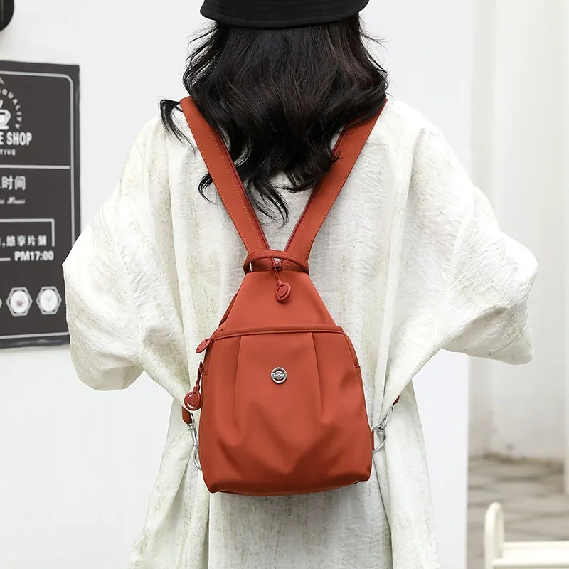2025 New Mini Backpack - Stylish Anti-Theft Chest Bag | Lightweight Oxford Small Backpack for Commute & Shopping