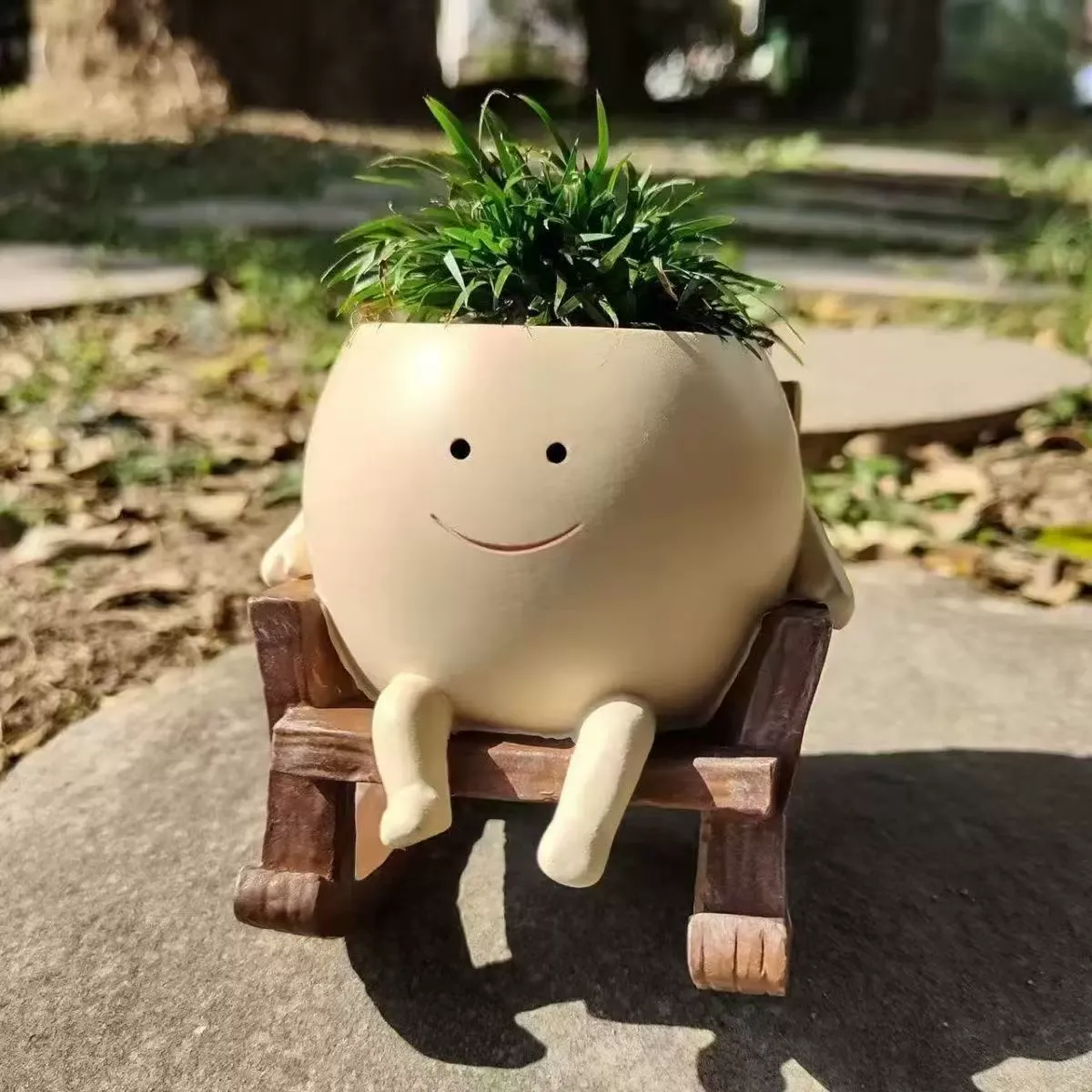 Small rocking chair with a smiling face, creative little flower pot — cute, perfect for succulents, suitable for balcony, indoor, or garden use.
