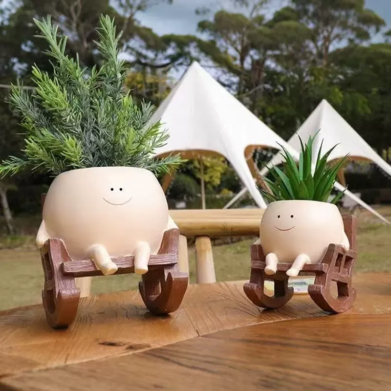 Small rocking chair with a smiling face, creative little flower pot — cute, perfect for succulents, suitable for balcony, indoor, or garden use.