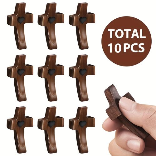 Thumb-sized cross-shaped walnut wood handle piece