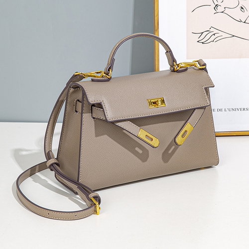 fashionable hand-held Kelly bag