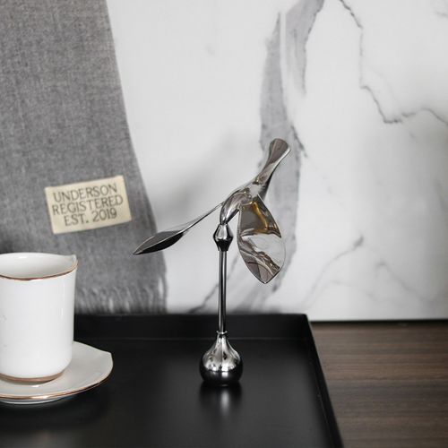 Magnetic levitation bird bottle opener