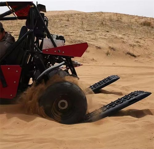 Outdoor vehicle recovery using traction boards