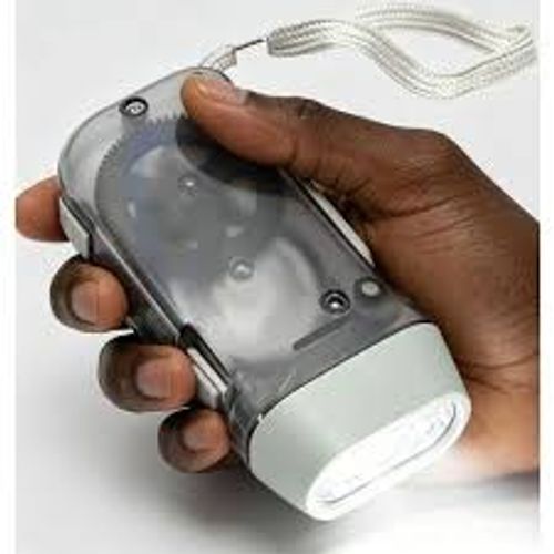 Portable, ultra-bright, mini LED emergency flashlight with manual hand-press power generation