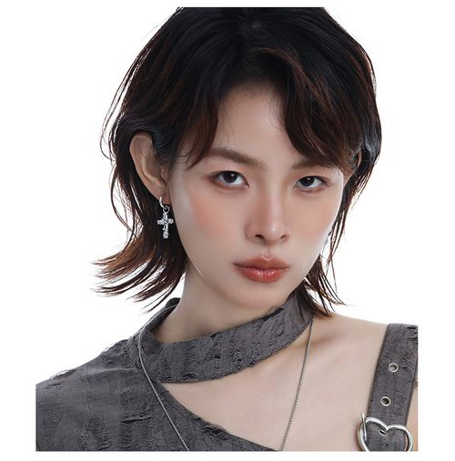 Fully encrusted sparkly crystals enshroud faith— the edgy highlight around your neck