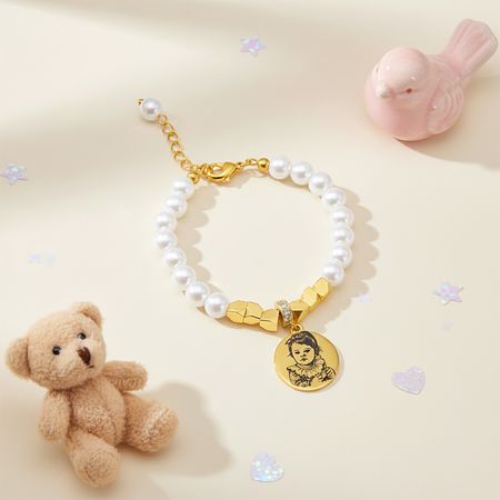 Customized pearl necklace featuring photos of Growth Footprints