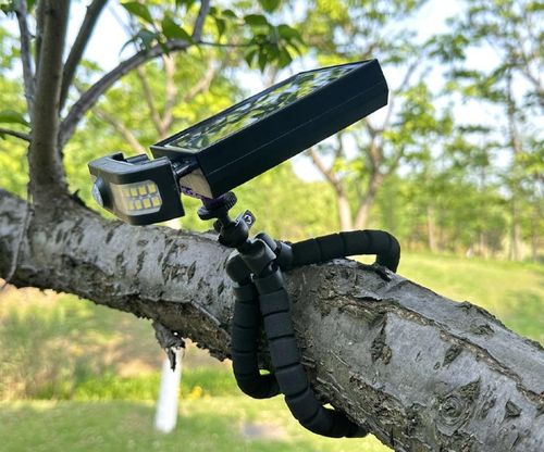 Portable Outdoor LED Solar Lights with Flexible Octopus Tripod Dual Charging Warm White Light for Camping Fence or Patio