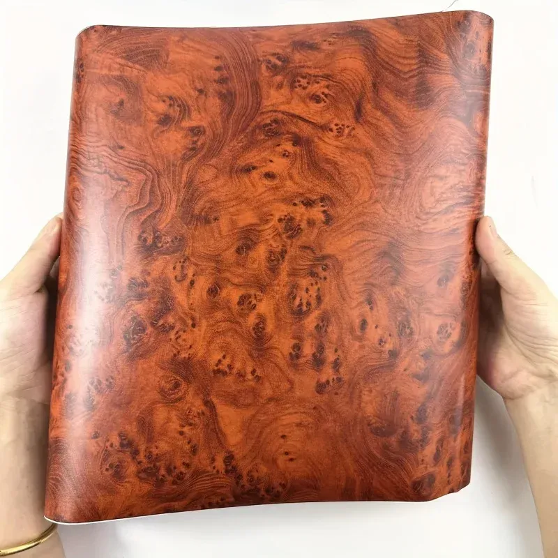 ملصق فينيل لتغليف داخلية السيارة بنقشة خشب البرل  (Burl Wood)، مقاس 30×120 سم، بلمسة نهائية لامعة وملمس خشبي، مخصص للوحة القيادة والكونسول الوسطي.